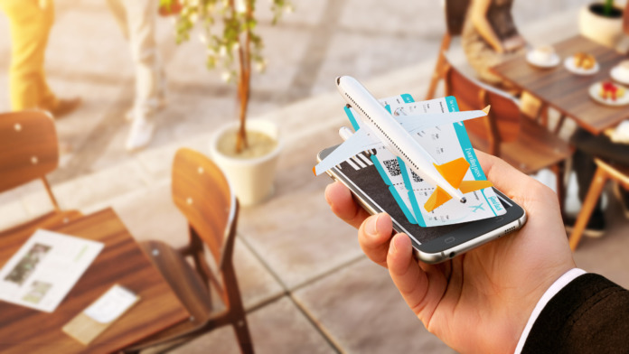 Smartphone application for online searching, buying and booking flights on the internet. Online check-in. Unusual 3D illustration of commercial airplane and boarding passes on smart phone in hand